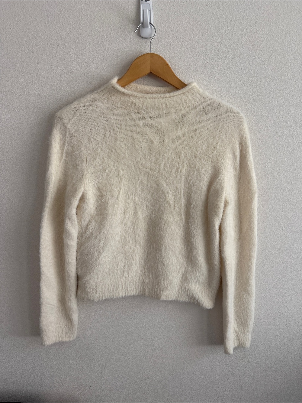 Mock neck cream fuzzy sweater